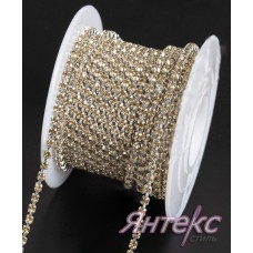 Цепочка со стразами декоративная арт. 2054 (2,4 мм.) уп.10 ярд. (золото в серебряной оправе)